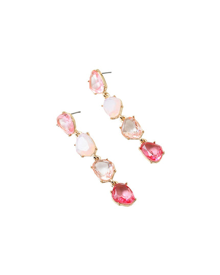 A pair of gold drop earrings featuring a cascading design of pink and white teardrop-shaped gemstones on a solid white background.