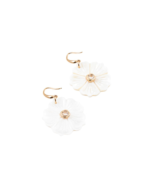 A pair of white flower-shaped drop earrings with gold-tone hooks and a small clear rhinestone in the center, shown on a plain white background.