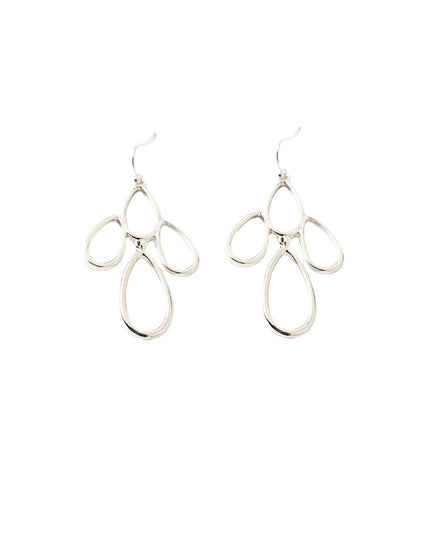 A pair of silver dangle earrings with an abstract, openwork teardrop and loop design, shown on a plain white background.