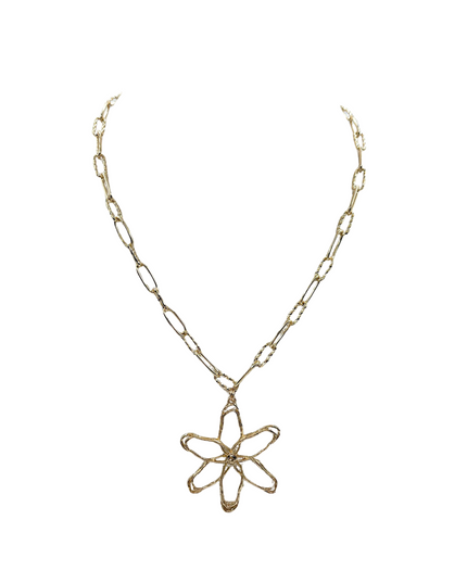A gold-toned chain necklace featuring a stylized, openwork flower pendant, shown against a plain white background.