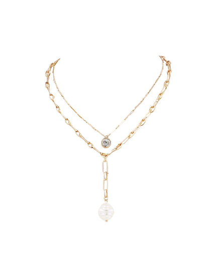 A delicate gold-toned double-layer necklace featuring a small round silver-toned medallion on one layer and a larger paperclip link leading to a faceted white pearl pendant on the other, displayed on a clean white background.