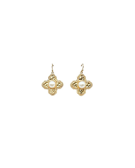 A pair of gold-tone filigree clover-shaped dangle earrings with a central white pearl, shown on a plain white background.