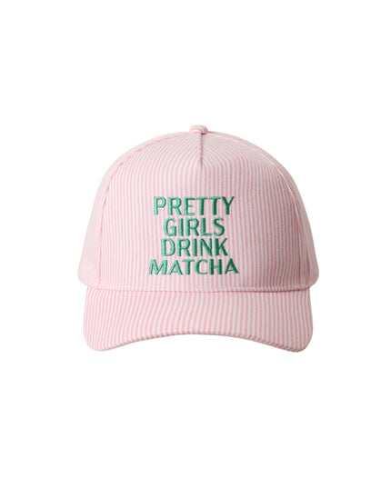 Pink cap with 'Pretty Girls Drink Matcha' text on a white background