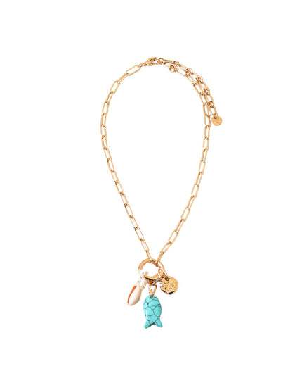 A gold chain anklet featuring a turquoise sea turtle charm, a small conch shell charm, and a round gold disc charm, displayed on a clean white background.