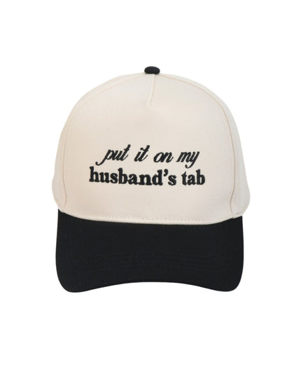 Beige and black cap with text 'put it on my husband's tab' on a white background