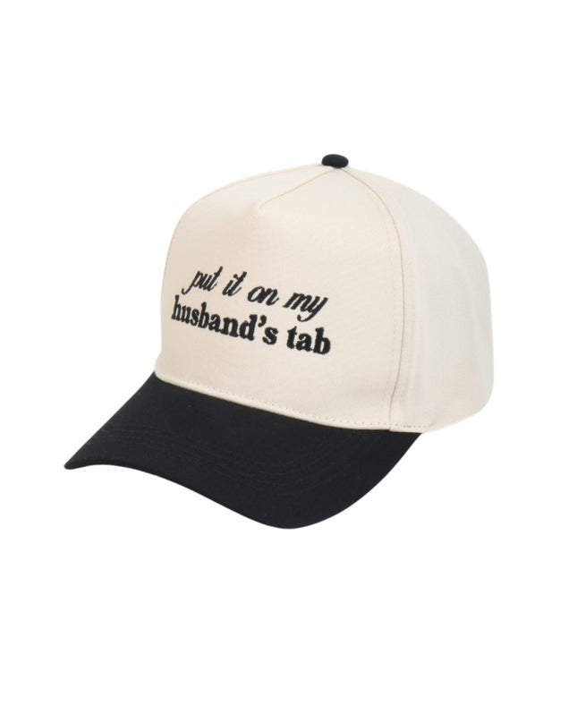 Two-toned cap with text 'put it on my husband's tab' on a white background