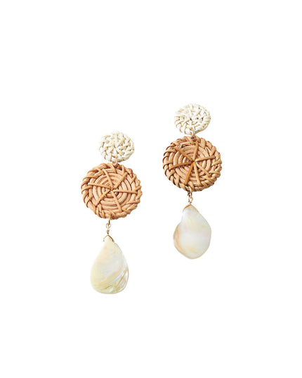 A pair of bohemian-style dangle earrings featuring a round woven rattan top, a small white textured ball stud, and a teardrop-shaped white mother-of-pearl drop, shown on a plain white background.