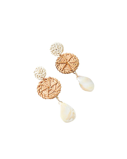 A pair of bohemian-style dangle earrings featuring textured cream and tan woven circular discs, a round cream bead, and a teardrop-shaped cream shell drop, shown on a plain white background.