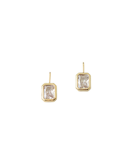 Gold hoop earrings on a white background