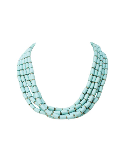 A multi-strand turquoise beaded necklace with small metallic spacer rings, displayed against a solid white background.
