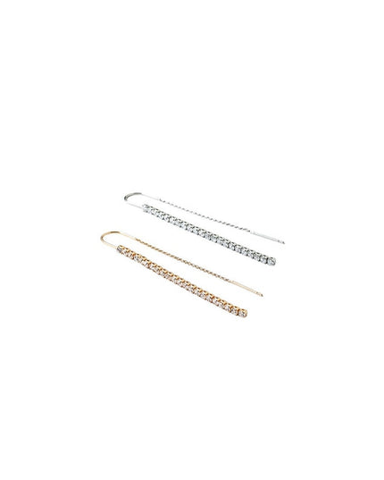 Two gold and silver hairpins on a white background