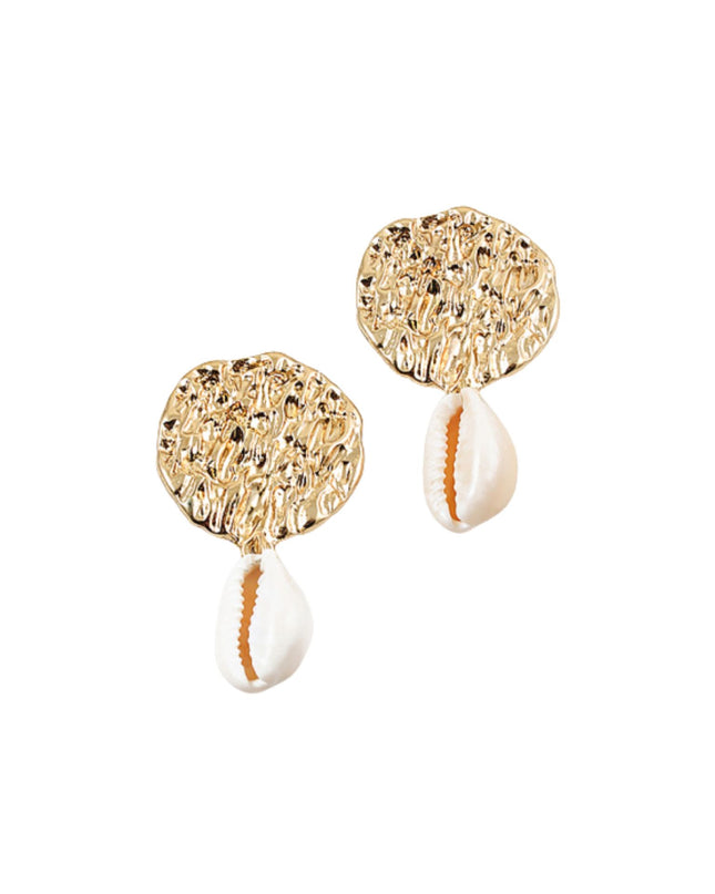 Gold earrings with white beads on a white background