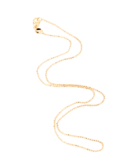 A delicate gold chain necklace with a small clasp, arranged in a loose spiral on a plain white background.