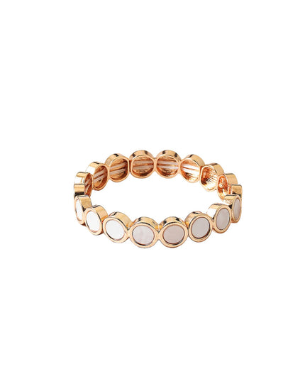 A rose gold stretch band featuring a row of oval bezel-set white mother-of-pearl inlays, shown against a plain white background.