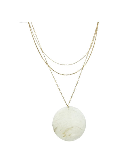 A multi-layered necklace featuring three delicate gold-tone chains and a large, round, white marble pendant with subtle gray veining, shown against a plain white background.