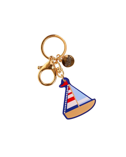 Sailboat keychain with gold ring on a white background