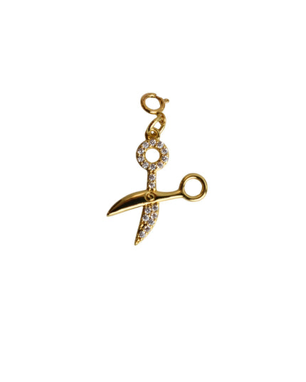 A gold-toned scissors charm embellished with clear rhinestones, featuring a lobster clasp at the top, shown on a plain white background.