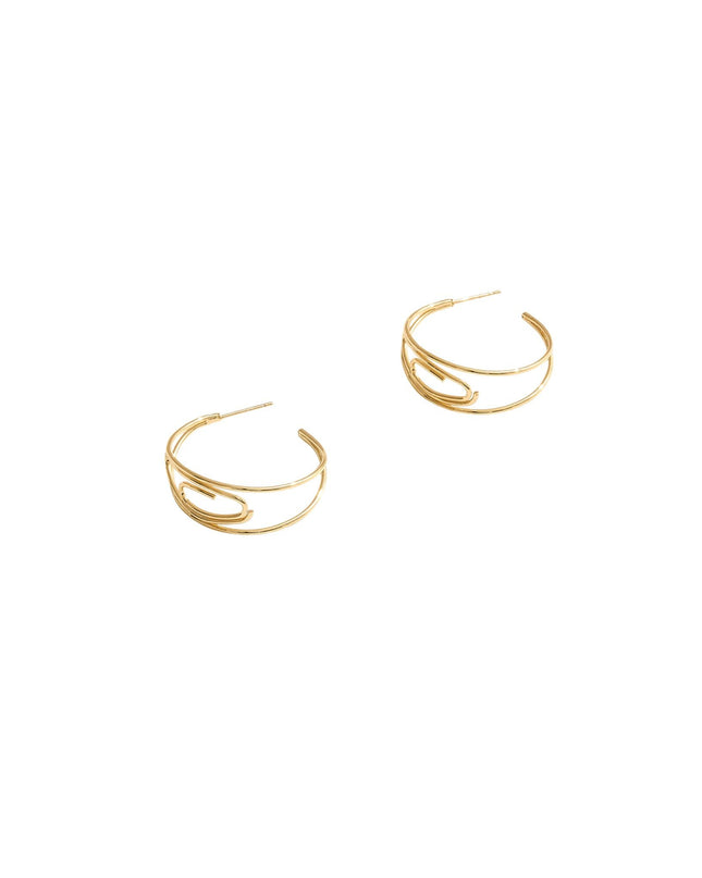 Gold hoop earrings on a white background