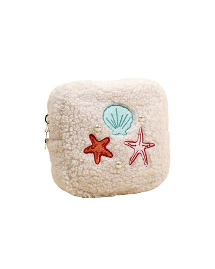 Beige pouch with starfish and shell designs on a white background