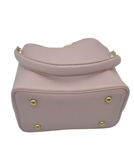 Pink handbag with gold studs on a white background