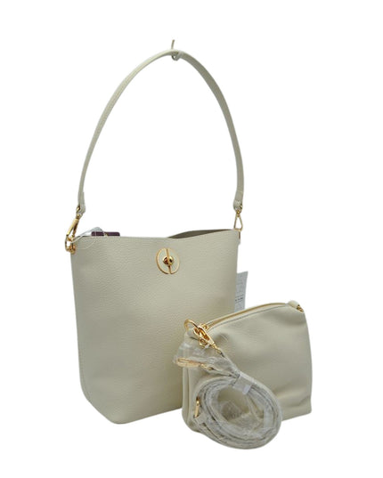 Beige handbag with matching pouch on a white background