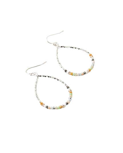 A pair of silver teardrop hoop earrings with small multicolor beads along the front, suspended from silver fishhook ear wires, shown on a plain white background.