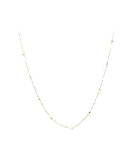 A delicate gold chain necklace featuring small, evenly spaced triangular bead charms, displayed against a solid white background.