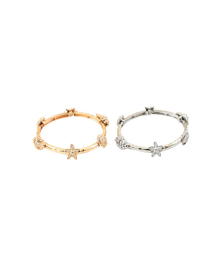 Two slim bangle bracelets with textured starfish details, shown side by side on a plain white background. One bracelet is rose gold, and the other is silver.