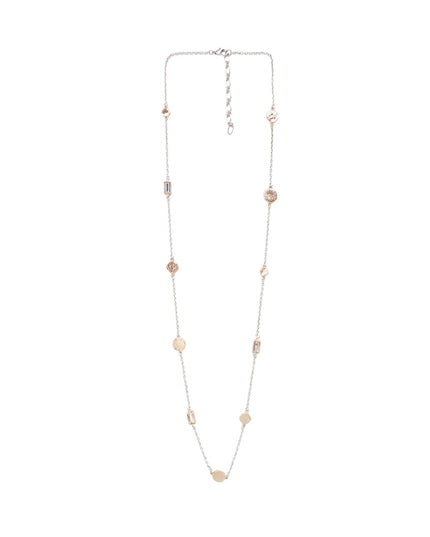 A delicate silver-toned chain necklace with scattered small gold-toned disc charms and a matching extender clasp, shown on a plain white background.