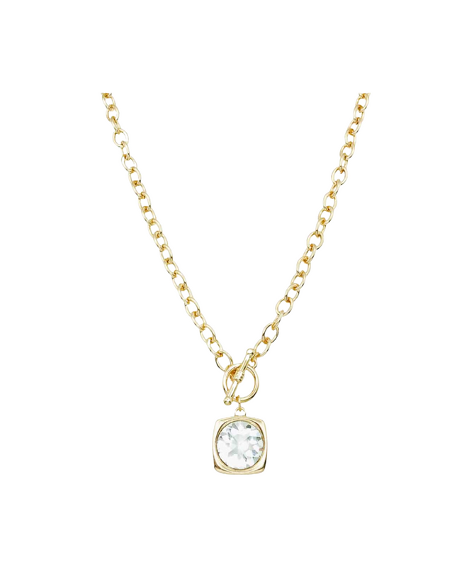 A delicate gold chain necklace with a small gold ring clasp holding a clear, bezel-set round gemstone, shown against a plain white background.