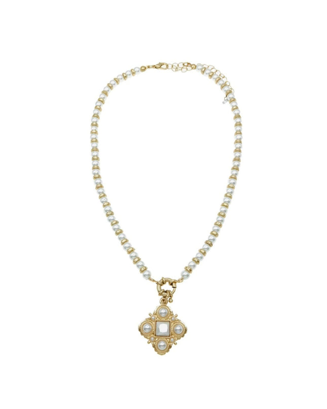 A gold-plated necklace featuring a delicate chain of small white pearls and a central quatrefoil pendant with a square white stone surrounded by small clear crystals, set against a plain white background.