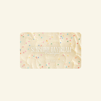 Gift card with 'Sunshine Daydream Boutique' text and colorful sprinkles on a beige background