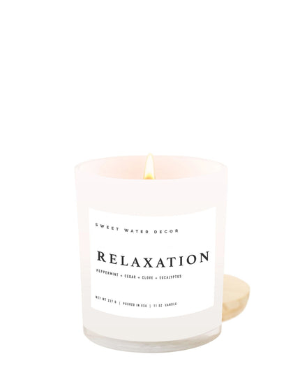 Candle with 'Relaxation' label on a white background