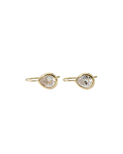 A pair of gold post earrings with pear-cut clear gemstones in bezel settings, shown against a plain white background.