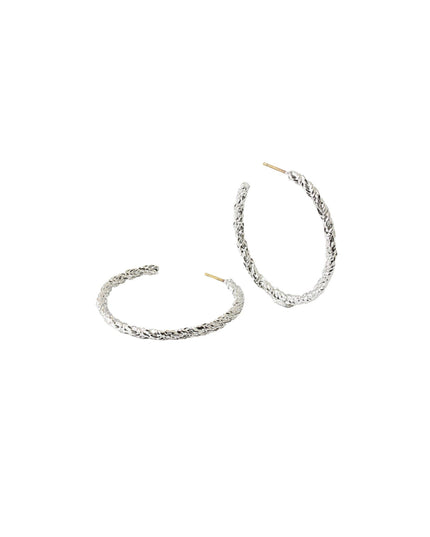 A pair of textured silver hoop earrings with post backs, displayed on a clean white background.