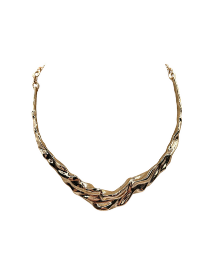 A textured, organic-shaped gold necklace with a twisted, wavy design, displayed on a solid white background.