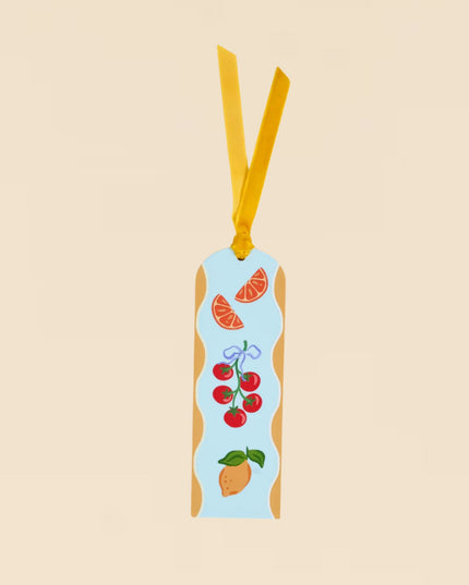 Bookmark with fruit design on a beige background