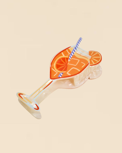 Illustration of a cocktail with orange slices and a straw on a beige background