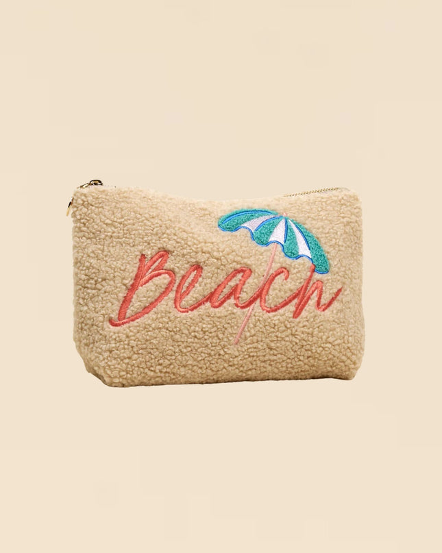 Beige pouch with 'Beach' and an umbrella design on a beige background