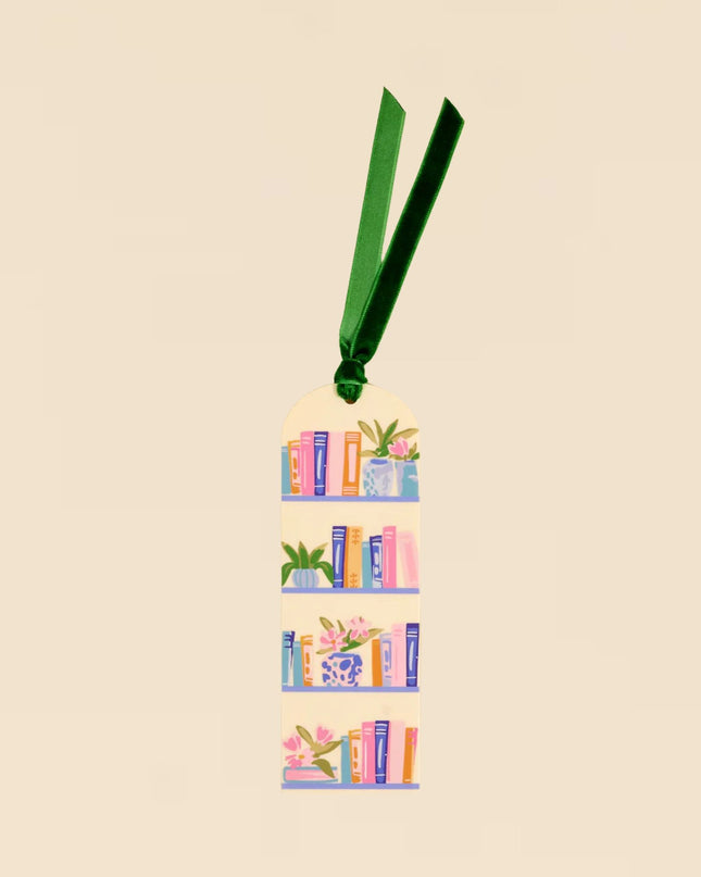 Bookmark with illustrations of books and plants on a beige background