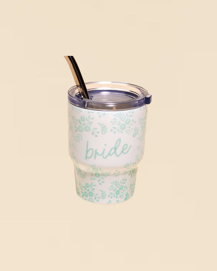 Tumbler with 'bride' text and floral design on a beige background