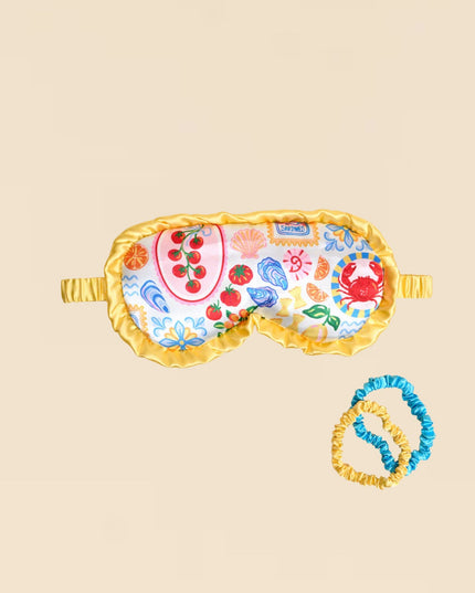 Decorative eye mask with colorful patterns on a beige background