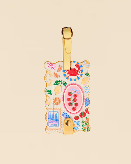 Decorative luggage tag with colorful design on a beige background