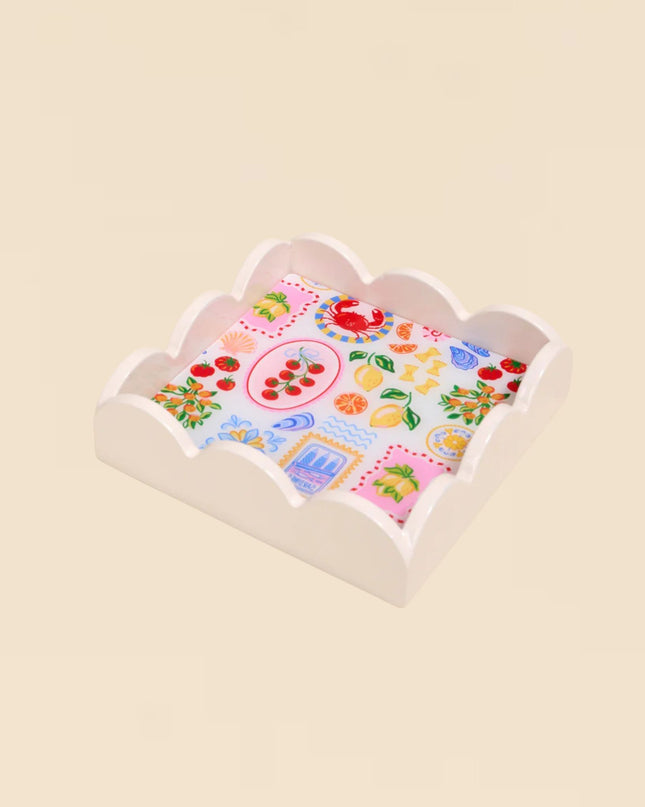 Decorative tray with colorful pattern on a beige background