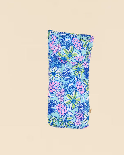 Floral patterned pouch on a beige background