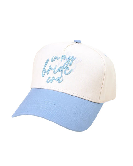 Blue and white cap with 'in my bride ear' text on a white background