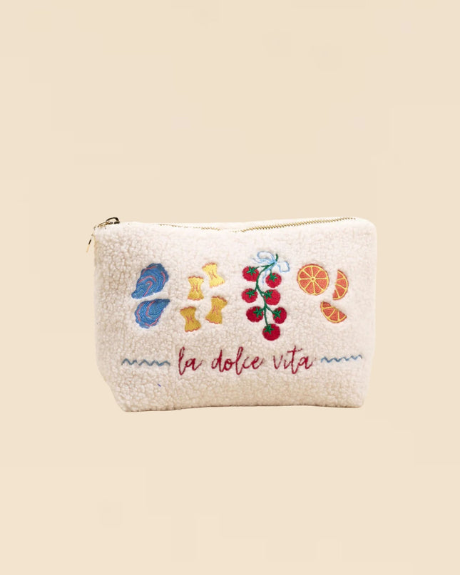 Small pouch with floral designs and 'la dolce vita' text on a beige background