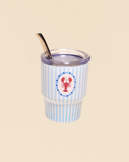 Tumbler with blue and white striped pattern and lobster design on a beige background