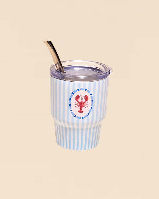 Tumbler with blue and white striped pattern and lobster design on a beige background