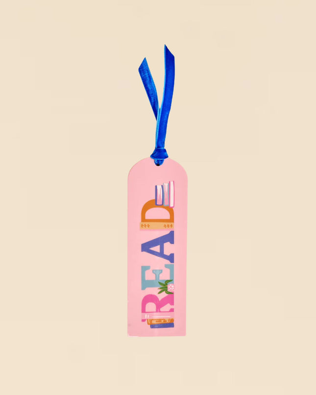 Pink bookmark with colorful text and a blue ribbon on a beige background